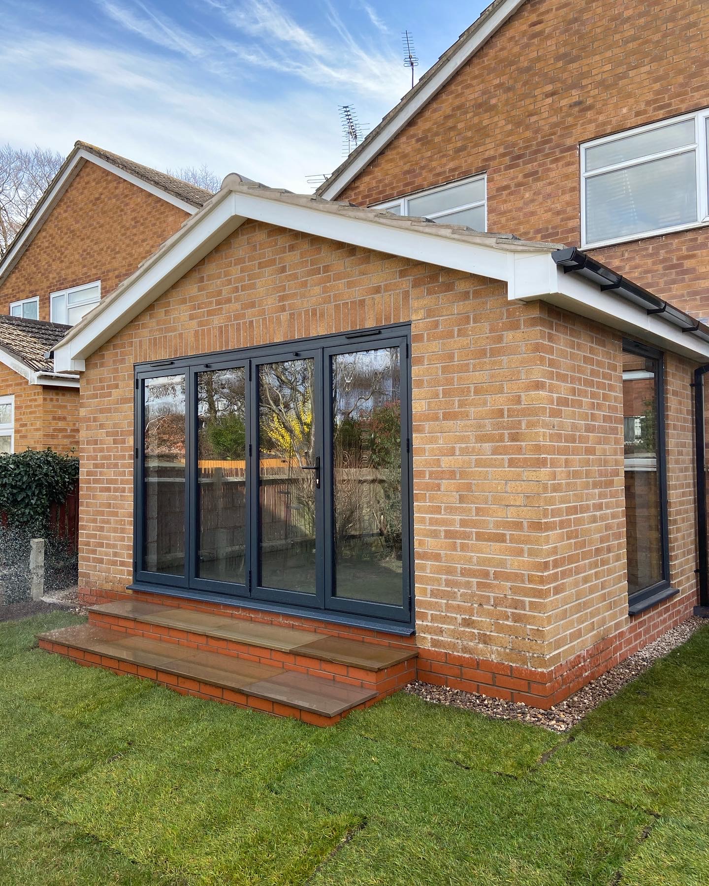 Single-storey extension with bi-fold doors