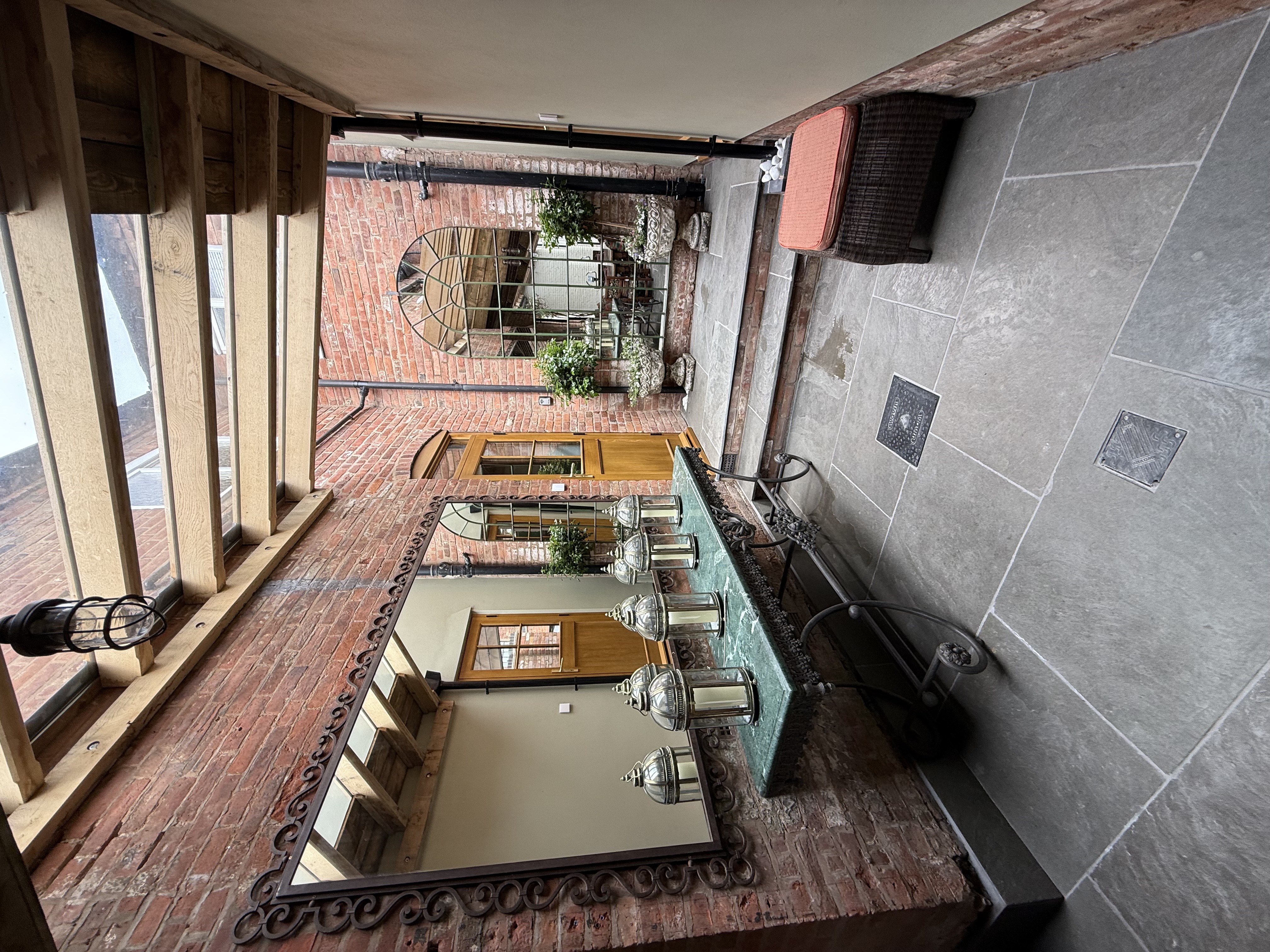 Barn conversion courtyard with natural stone flooring