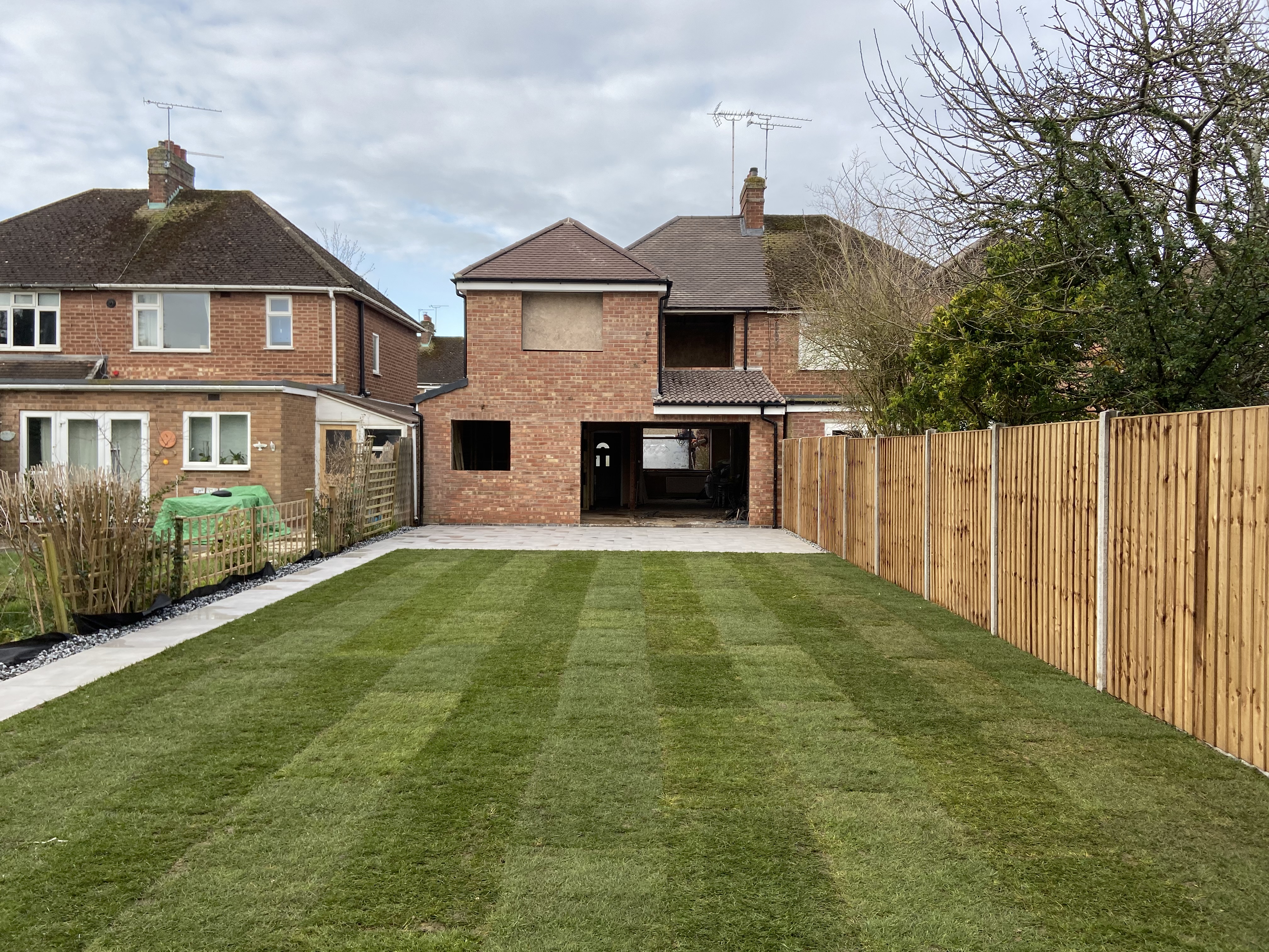 New rear garden and paved patio, mid-build